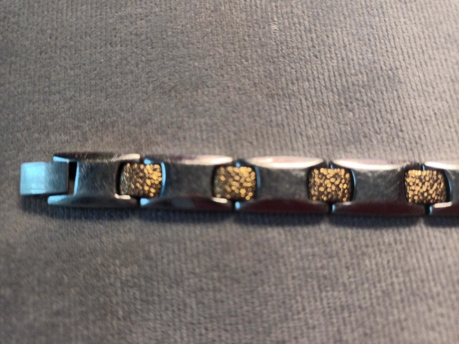 Titanium Lemagico  armband met goud en zilverkleur, Ophalen of Verzenden, Gebruikt, Zilver, Overige materialen