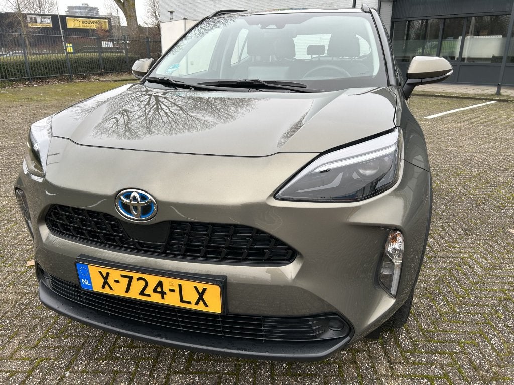 Toyota Yaris Cross 1.5 Vvt-i Hybrid 116pk CVT 2024, Auto's, Stof, 750 kg, 4 cilinders, 23 km/l
