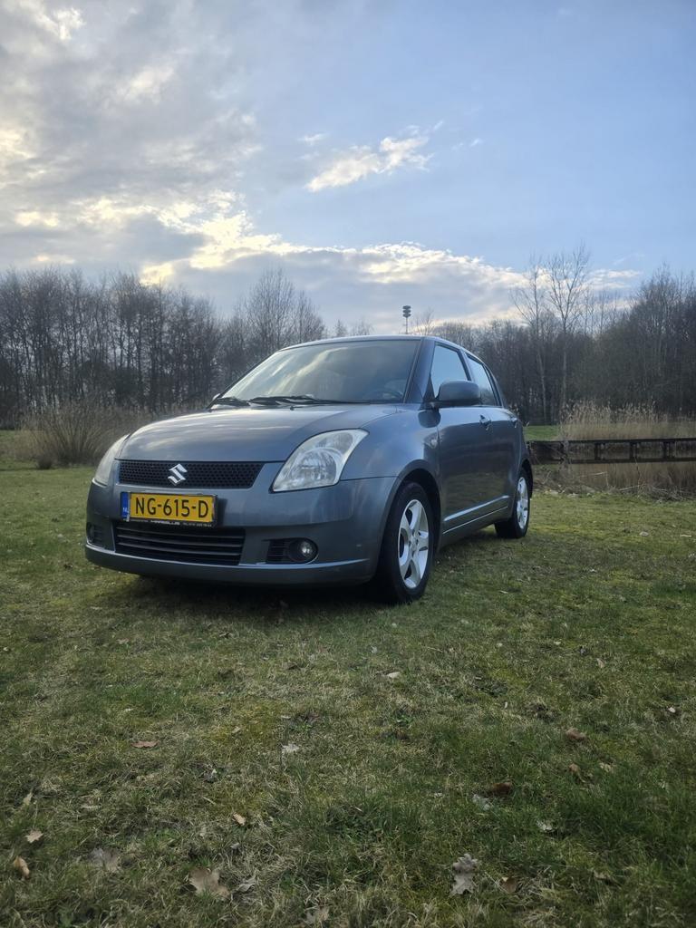 Suzuki Swift 1.3 5DRS 2007 Grijs weinig kilometers, Auto's, Voorwielaandrijving, 40 €/maand, 965 kg, 400 kg