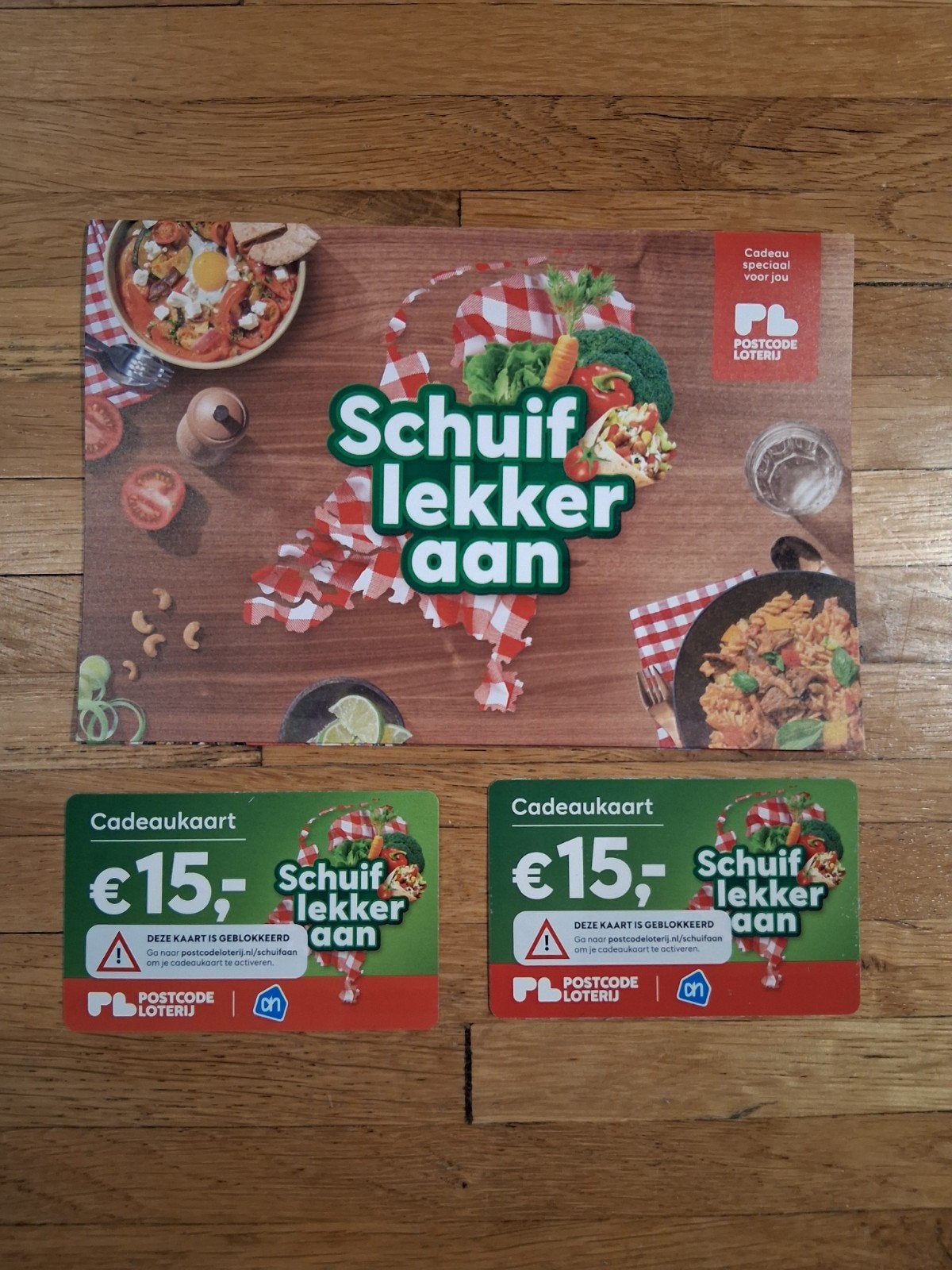 2 stuks postcodeloterij cadeaukaart ah twv 15 euro per stuk, Tickets en Kaartjes, Eén persoon, Cadeaubon