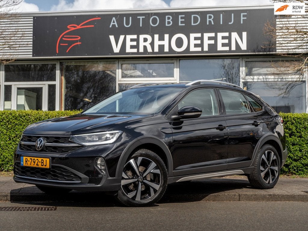 Volkswagen Taigo 1.0 TSI R-Line - AUTOMAAT - IQ LIGHT - PARK, Auto's, Volkswagen, Gebruikt, Euro 6, Zwart, Bedrijf