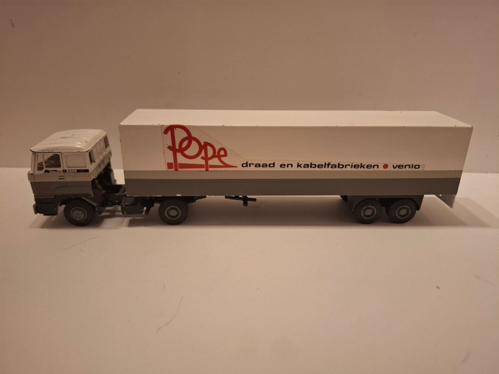 Daf 3300 met oplegger, Pope reclame, Hobby en Vrije tijd, Ophalen of Verzenden, Gebruikt, Bus of Vrachtwagen, Lion Toys