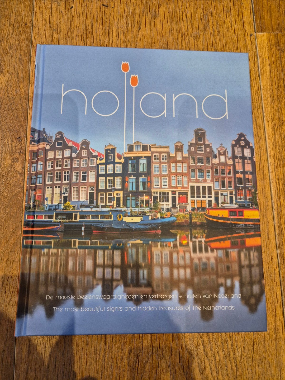 Holland: De mooiste bezienswaardigheden, Ophalen of Verzenden, Zo goed als nieuw, Reisgids of -boek, Benelux
