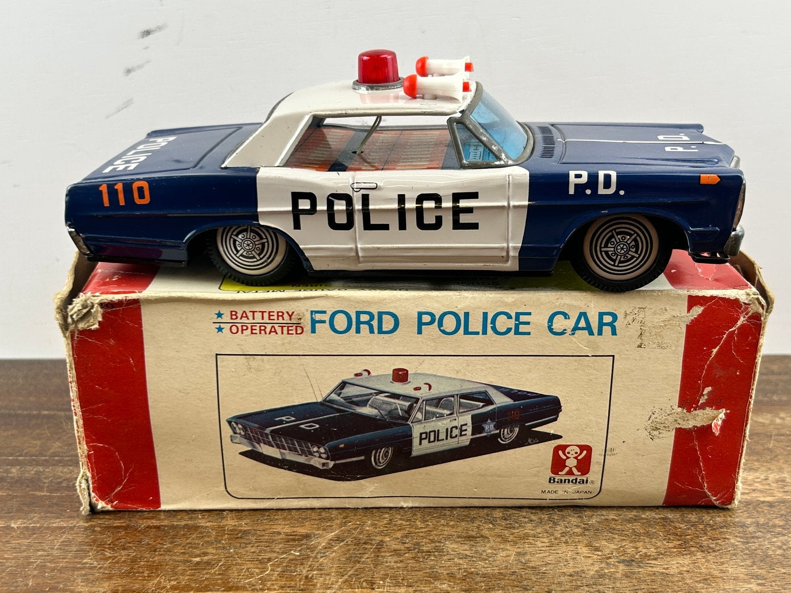Bandai 4340 Ford Police Car made in Japan, Antiek en Kunst, Ophalen of Verzenden