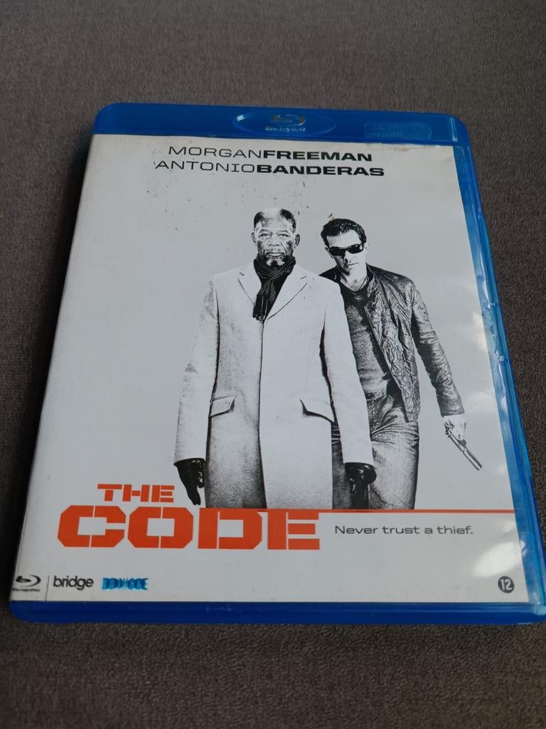 The code - bluray, Ophalen of Verzenden, Zo goed als nieuw, Actie
