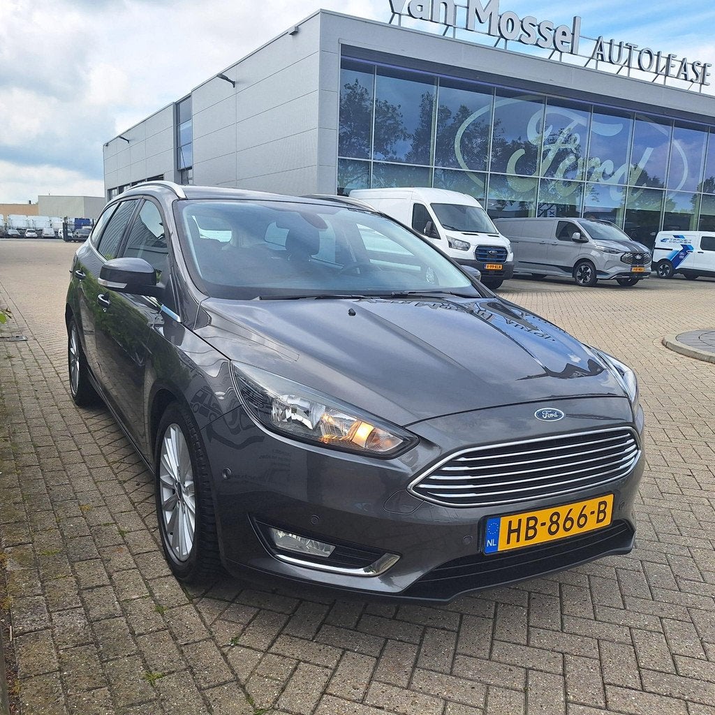 Ford Focus Wagon 1.0 Titanium Edition 125pk | Cruise Control, Auto's, 12 maanden, Gebruikt, Euro 6, Handgeschakeld