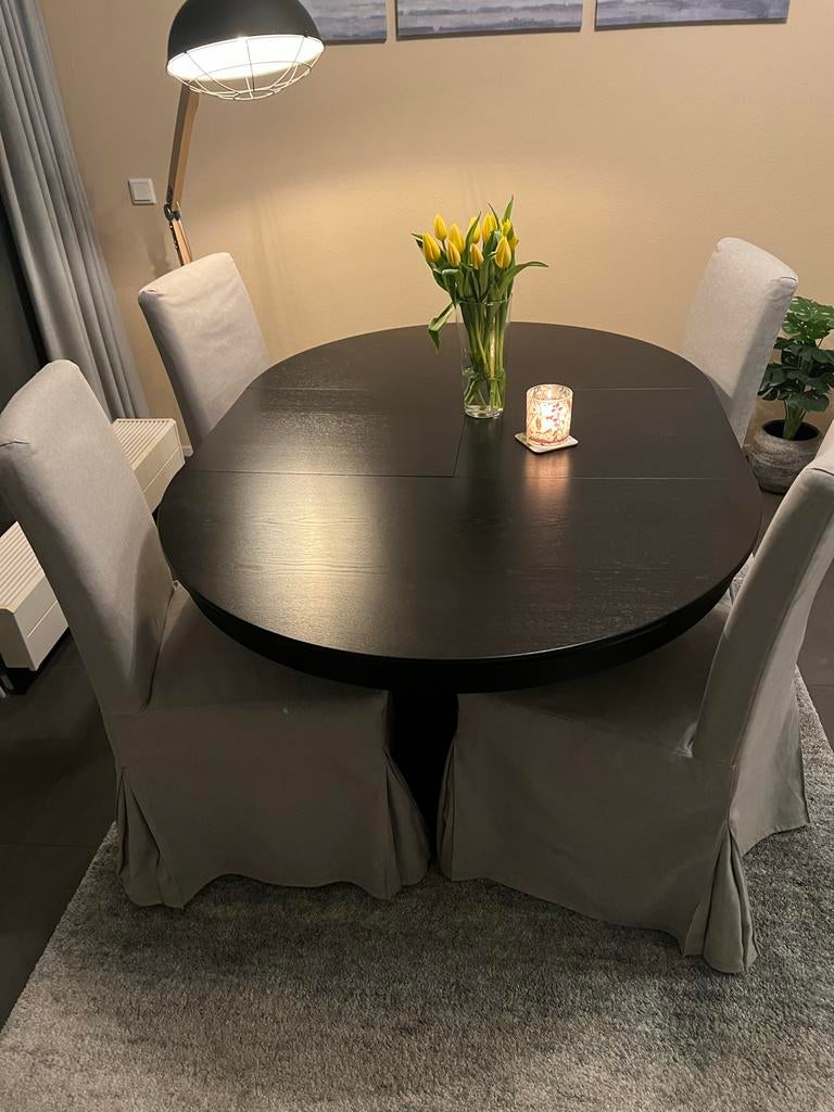 Zwarte ovale/ronde eettafel uitschuifbaar met 4 stoelen, Ophalen, 100 tot 150 cm, Zo goed als nieuw, Vijf personen of meer