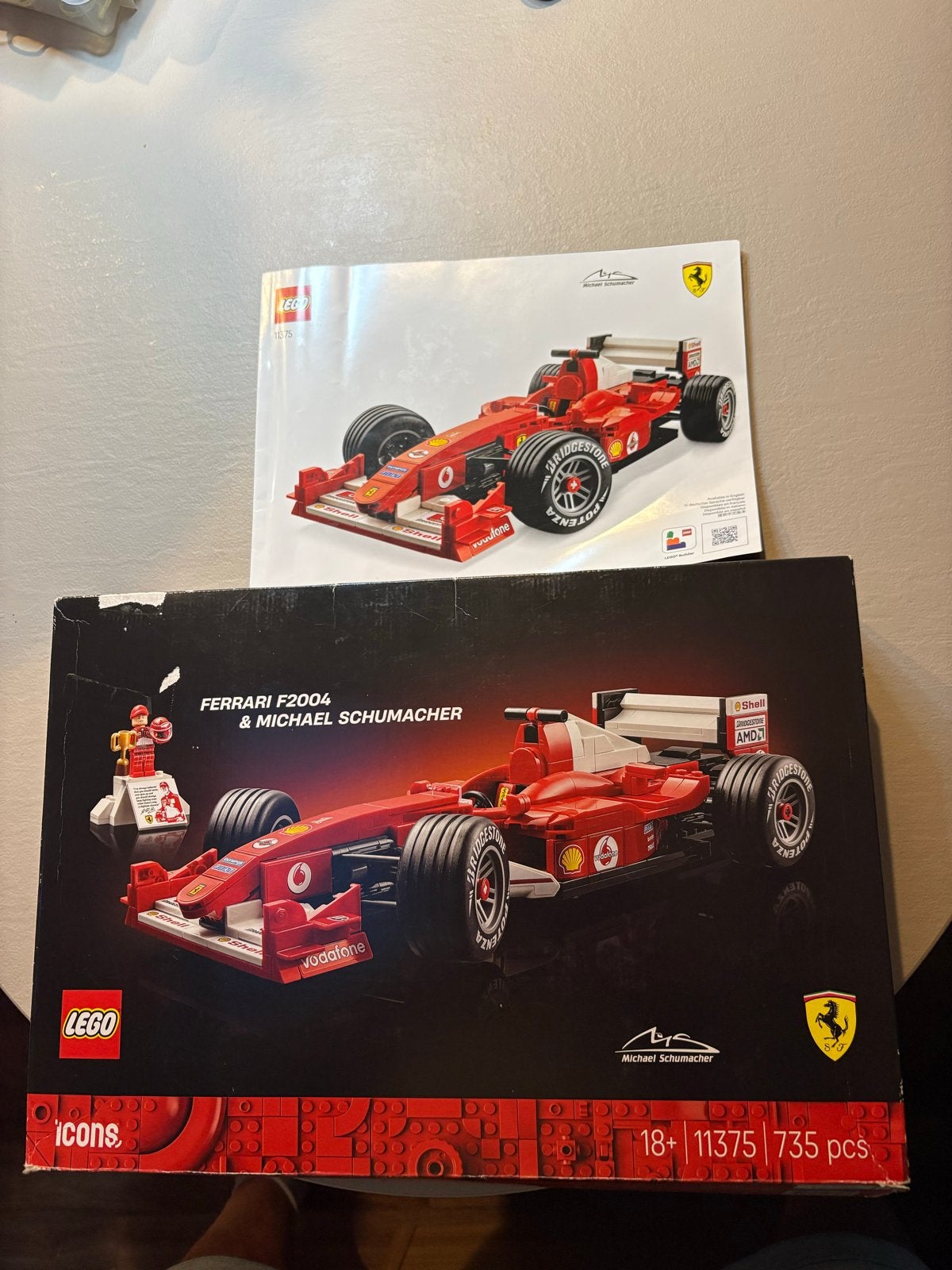 Doos en boekje Icons Ferrari F2004 & Michael Schumacher, Ophalen of Verzenden, Zo goed als nieuw, Overige merken