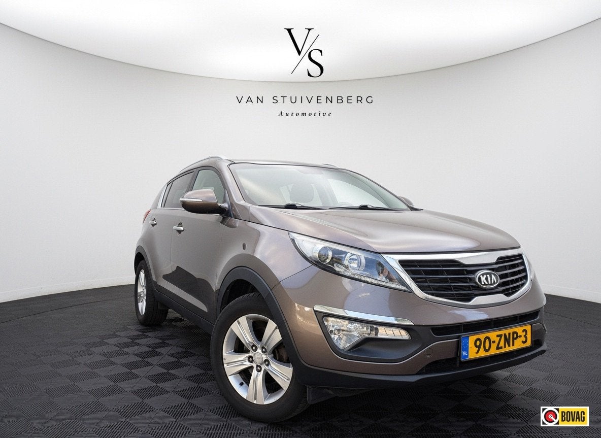 Kia Sportage 2.0 X-ecutive Plus Pack TREKHAAK NAVI LEDER BLU, Auto's, Gebruikt, 4 cilinders, Bruin, Leder en Stof