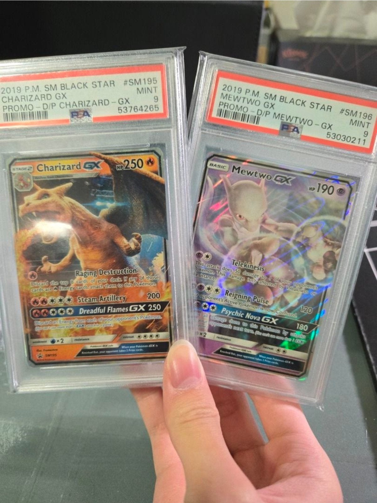 PSA Pokémon Kaarten: Charizard GX & Mewtwo GX, Ophalen of Verzenden, Zo goed als nieuw, Meerdere kaarten