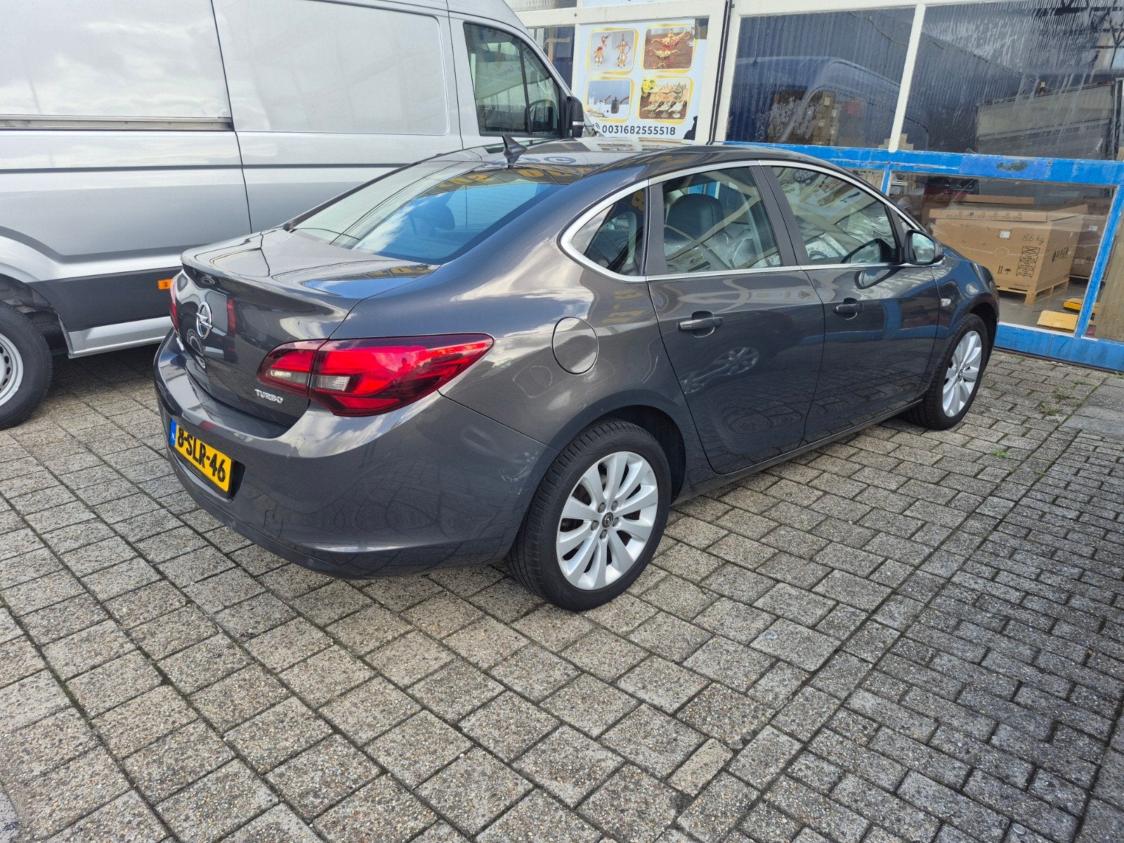 Opel Astra 1.4 Turbo Ecotec 103KW 4-D 2013 Grijs, Auto's, Voorwielaandrijving, 1250 kg, 4 cilinders, 700 kg