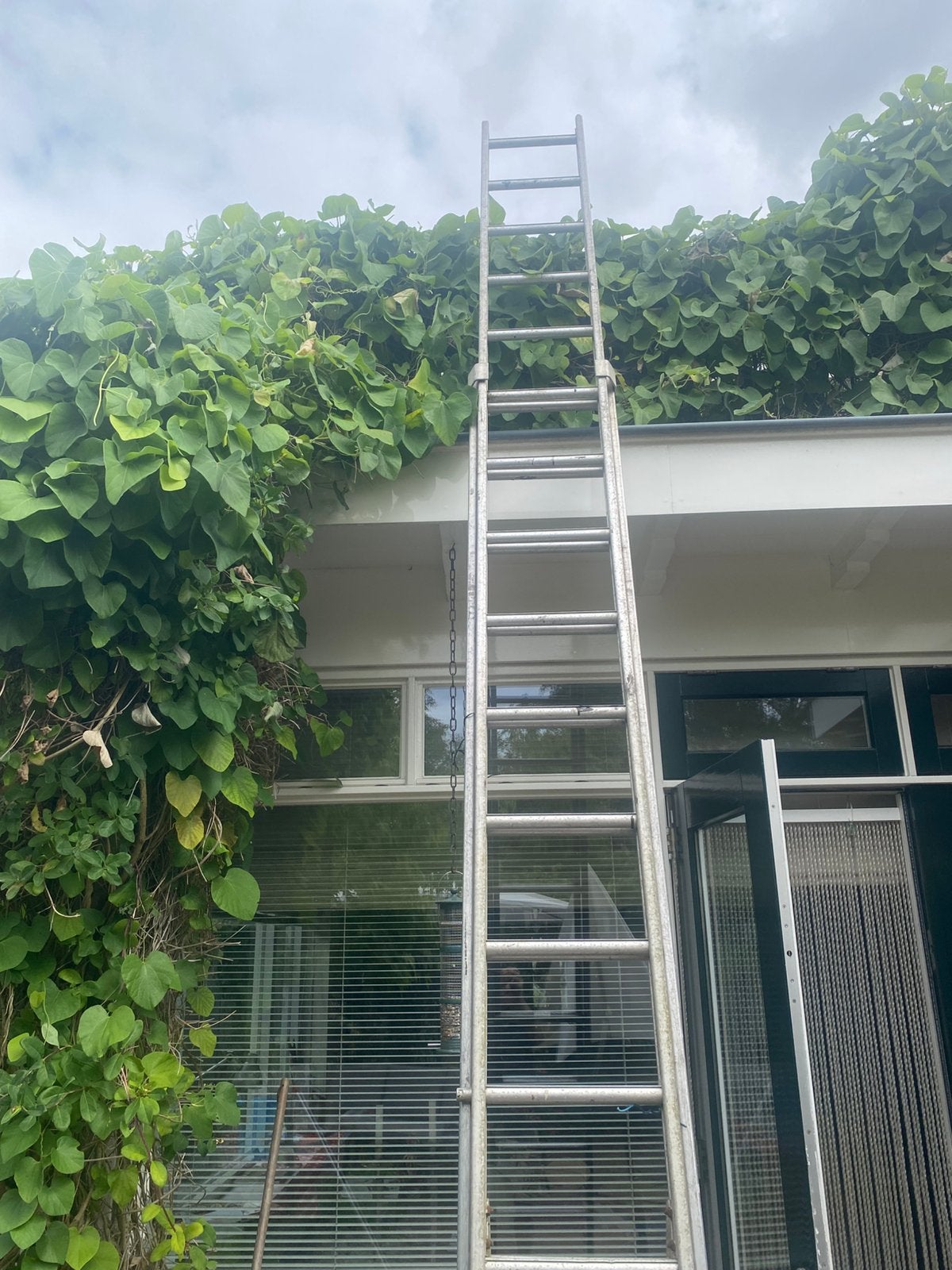 Te koop insteekladder 7 meter, Doe-het-zelf en Verbouw, Ladders en Trappen, Ophalen, Zo goed als nieuw, 4 meter of meer
