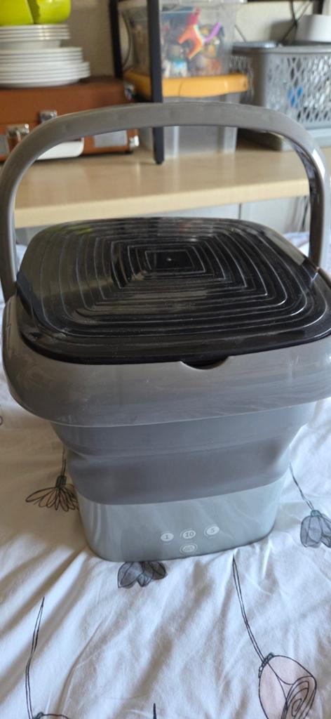 Camping wasmachine emmer, Ophalen