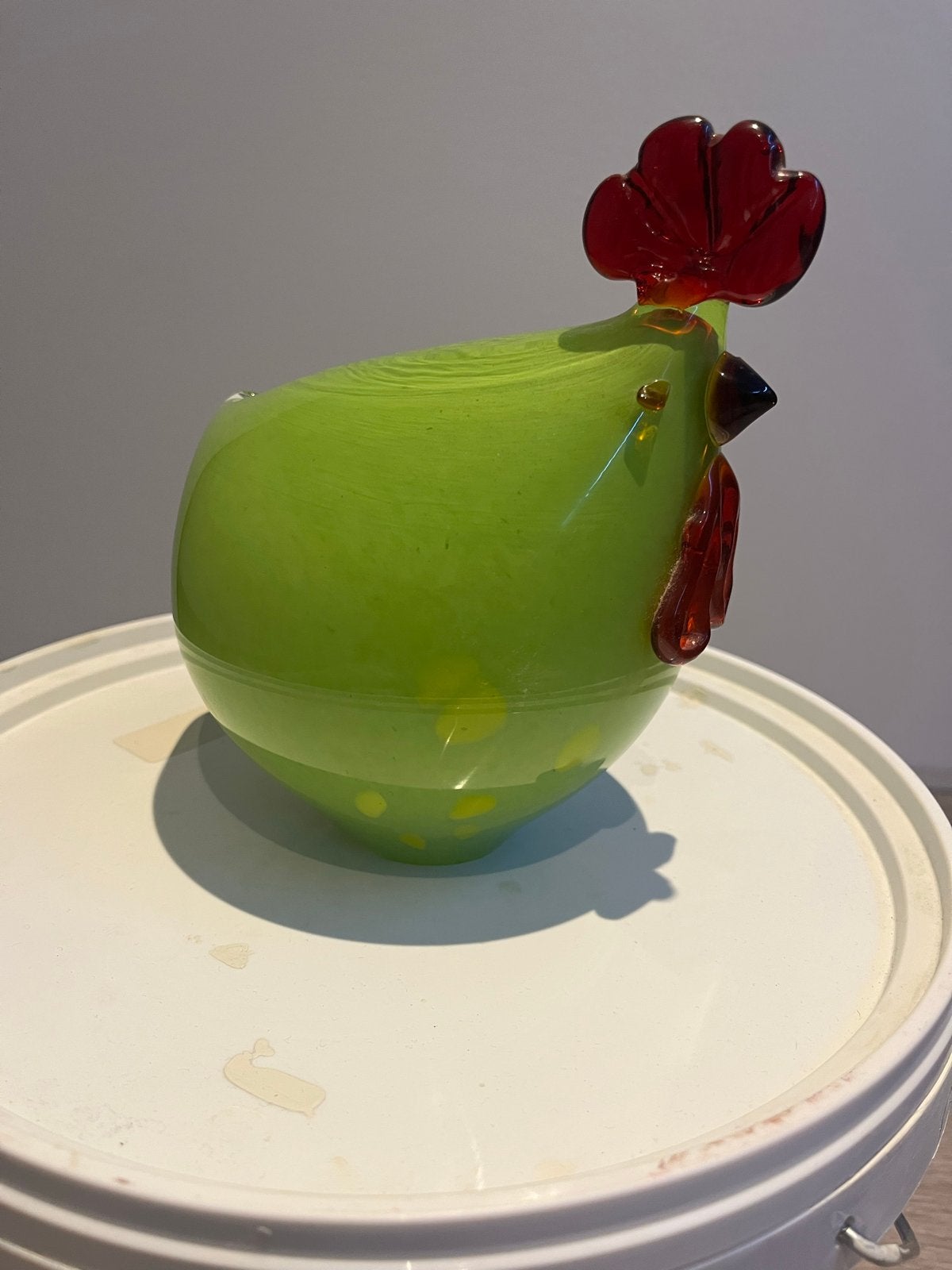 Groene glazen kip decoratie, Ophalen