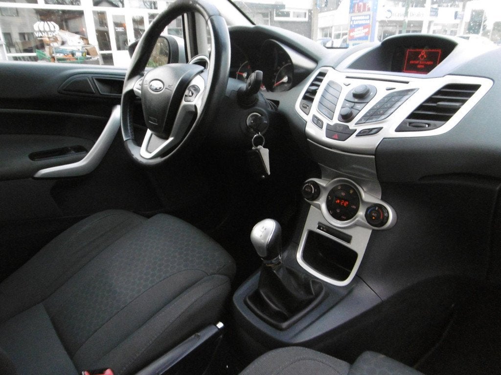 Ford Fiesta 1.6 Sport 120pk Clima Cruise PDC Historie Geen i, Auto's, Stof, Gebruikt, 31 €/maand, 4 cilinders