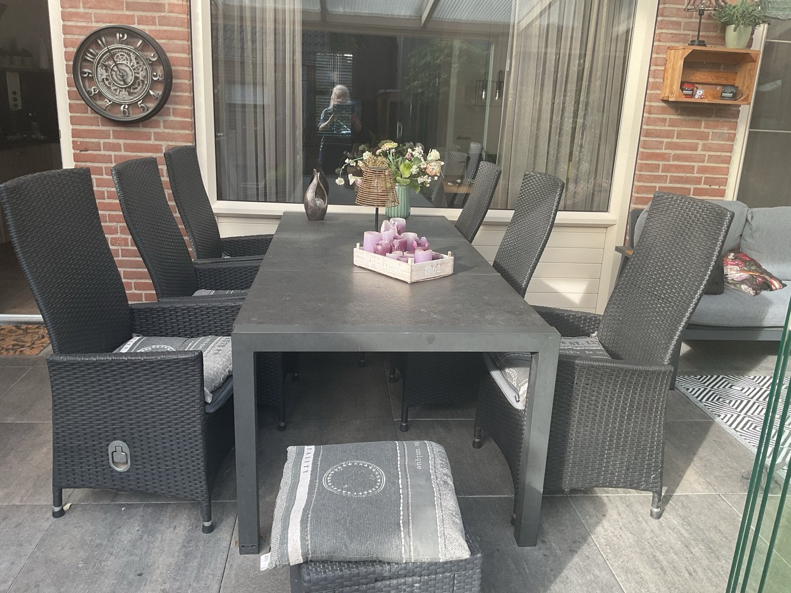 Tuinset:  tafel met natuursteen met 6 wicker stoelen