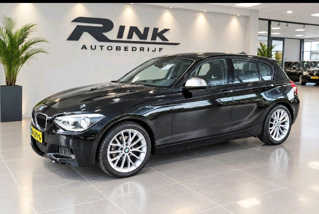 BMW 114i  5-DR 2014 f20, 1-Serie, Achterwielaandrijving, 4 cilinders, Zwart