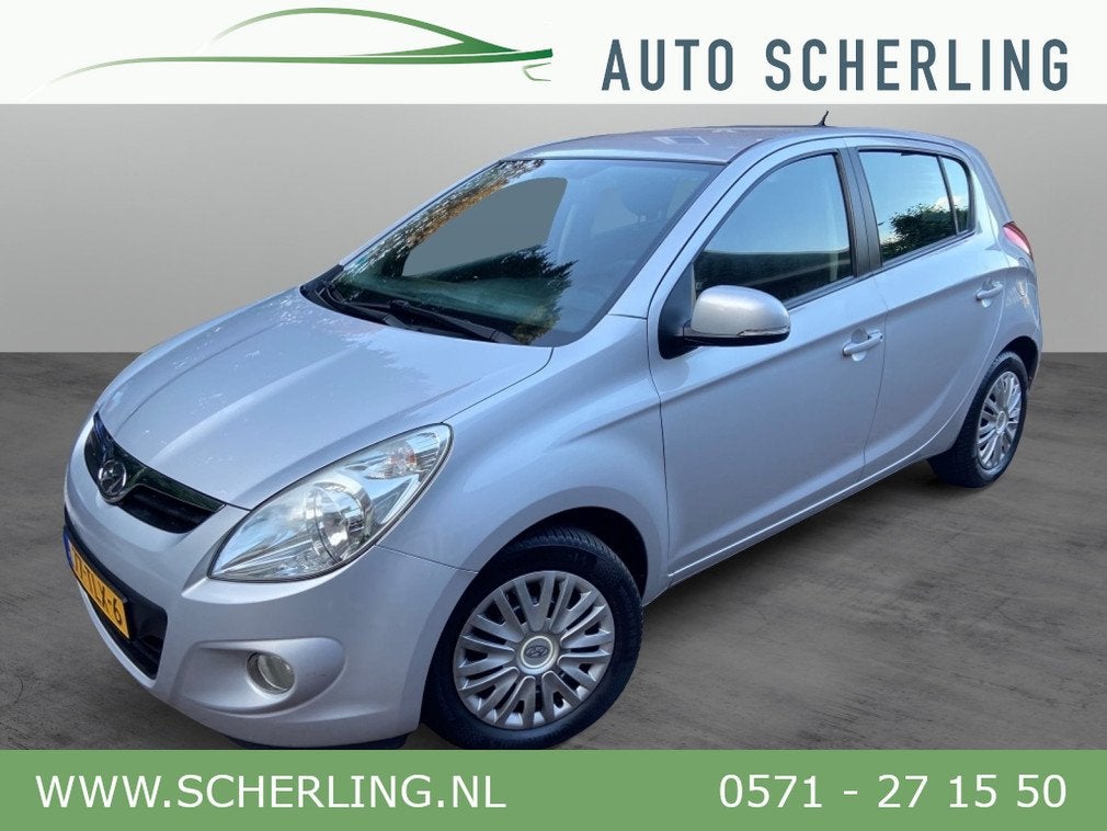 Hyundai i20 1.2i 5-deurs Plus Clima, Bluetooth NL-auto!, Auto's, Euro 5, Gebruikt, 31 €/maand, 4 cilinders