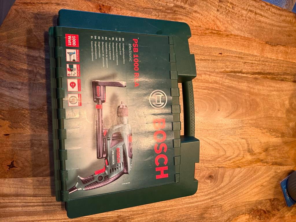 Bosch PSB 1000 RCA klopboormachine 1000W met koffer, Doe-het-zelf en Verbouw, Gereedschap | Boormachines, Gebruikt, Boormachine