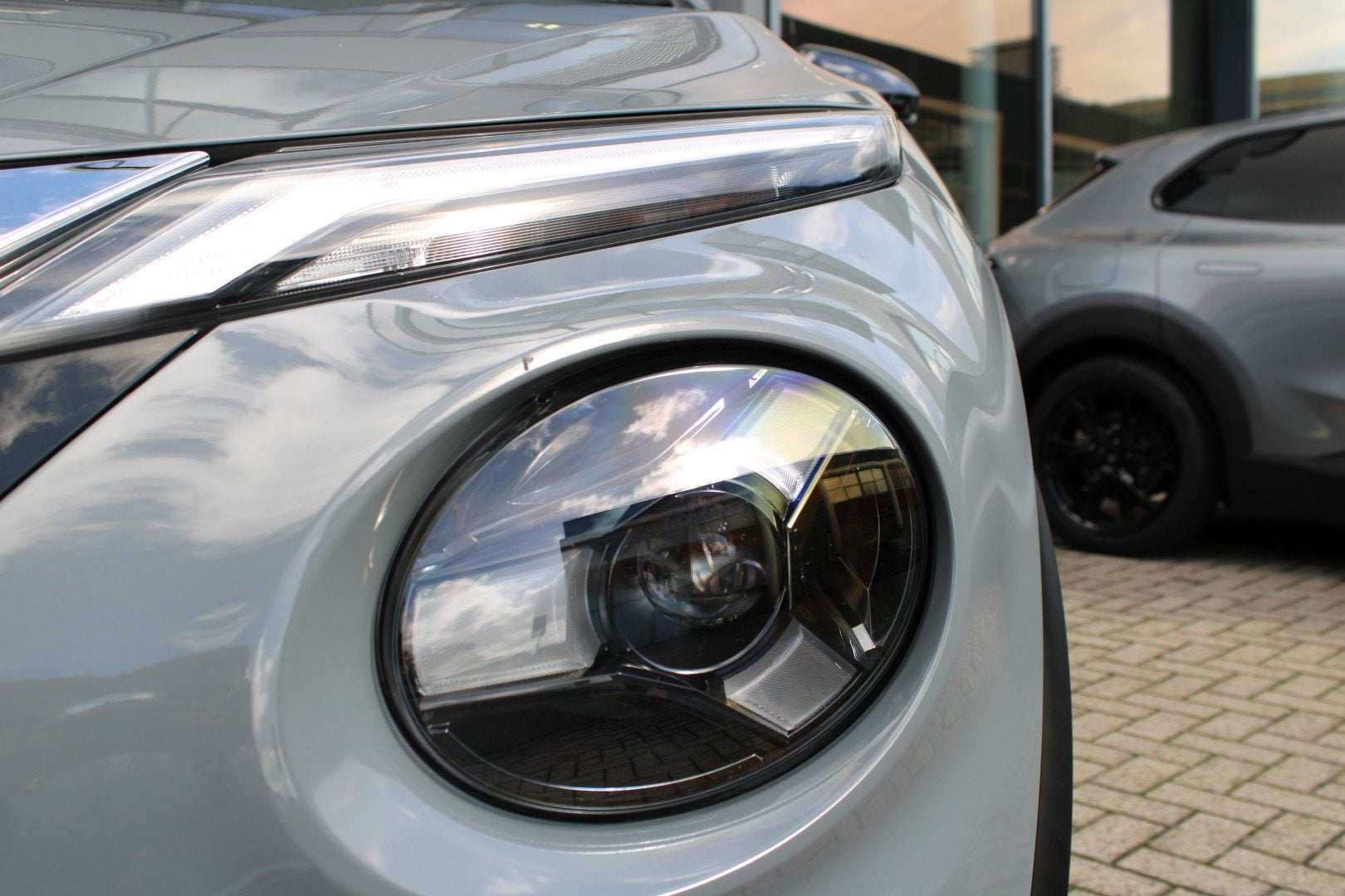 Foto 13 van NISSAN Juke 1.0 DIG-T 114pk Kiiro | Keyless | CruiseControl