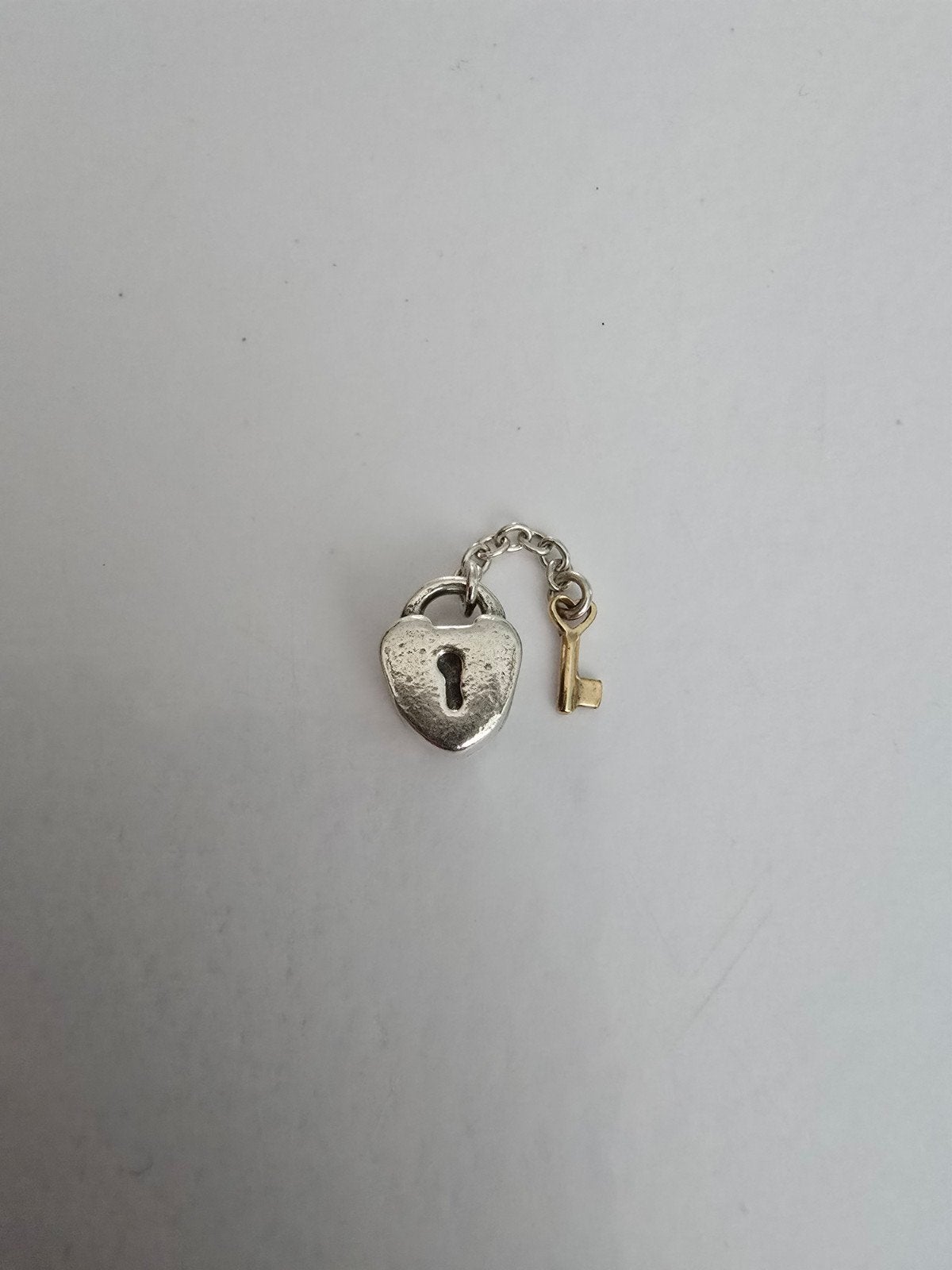 Prachtige originele bicolor Pandora bedel - zilver met goud, Sieraden, Tassen en Uiterlijk, Ophalen of Verzenden, Zo goed als nieuw