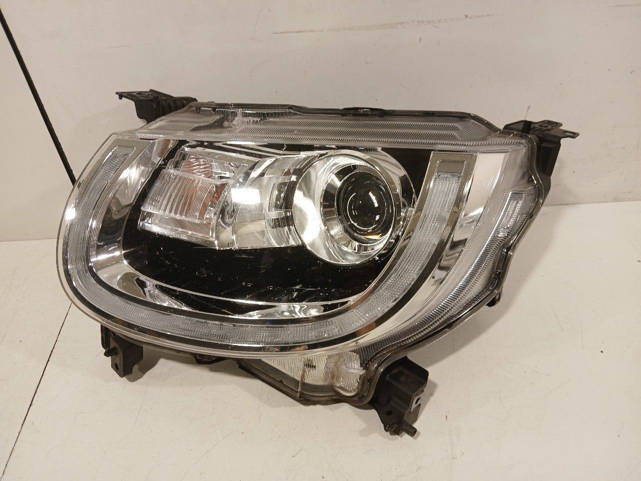 Koplamp links Suzuki Ignis, Auto-onderdelen, Verlichting, Onderdelen@venauto.nl, Van der Ven Autorecycling B.V., Gebruikt, Ettenseweg 76, 4706 PB Roosendaal, The Netherlands