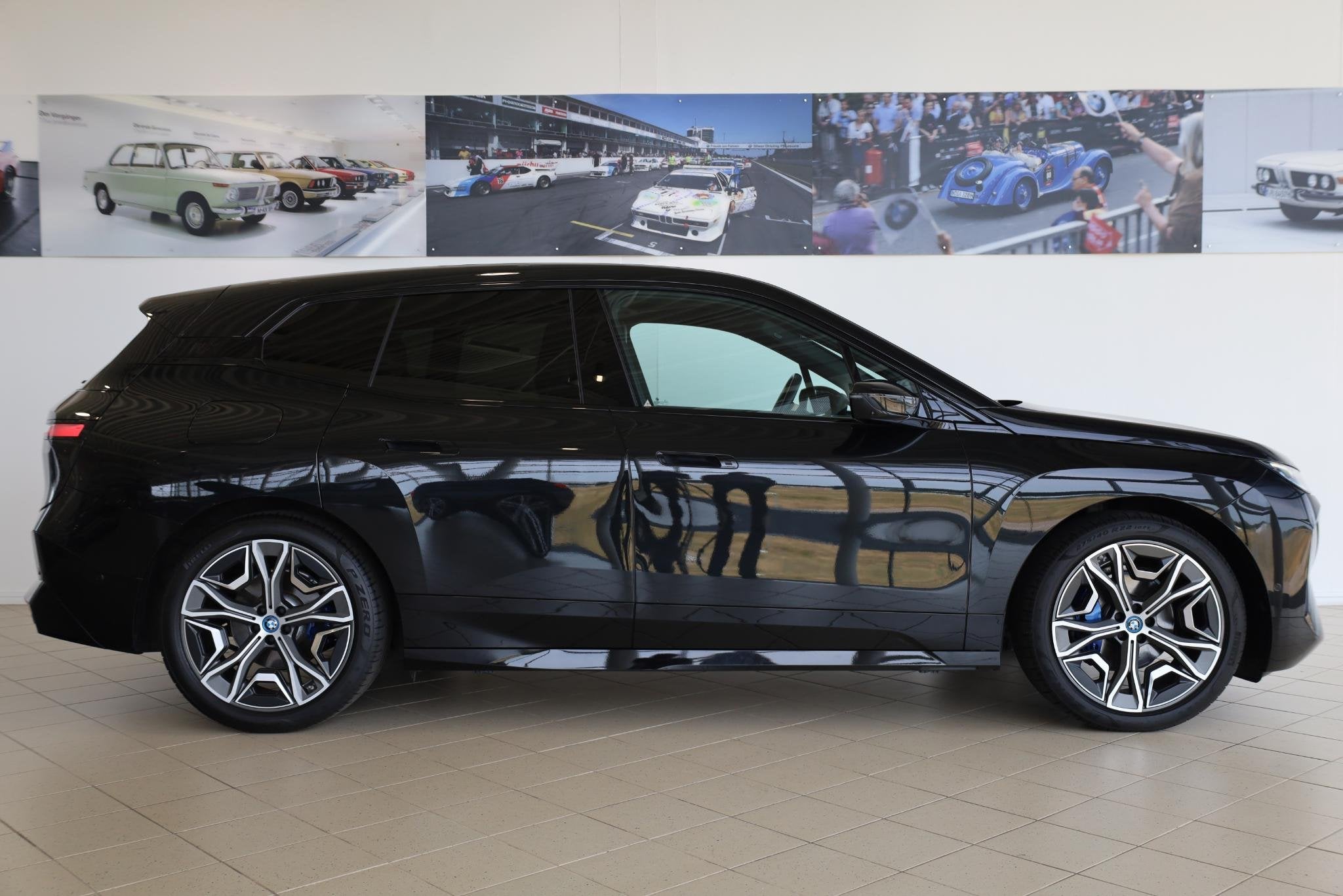 BMW iX xDrive40 High Executive 77 kWh | Driving Assistant Pr, Automaat, 34 min, Stof, Gebruikt