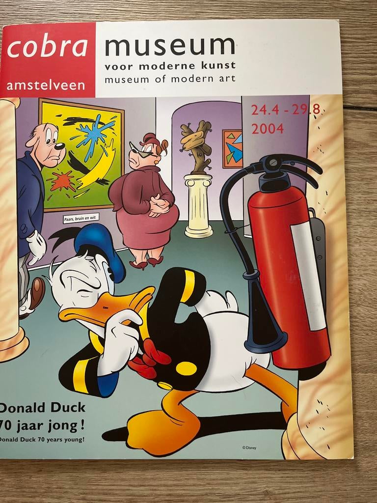 Donald Duck 70 jaar jong! Cobra Museum Catalogus 2004, Boeken, Stripboeken, Eén stripboek, Ophalen of Verzenden, Zo goed als nieuw