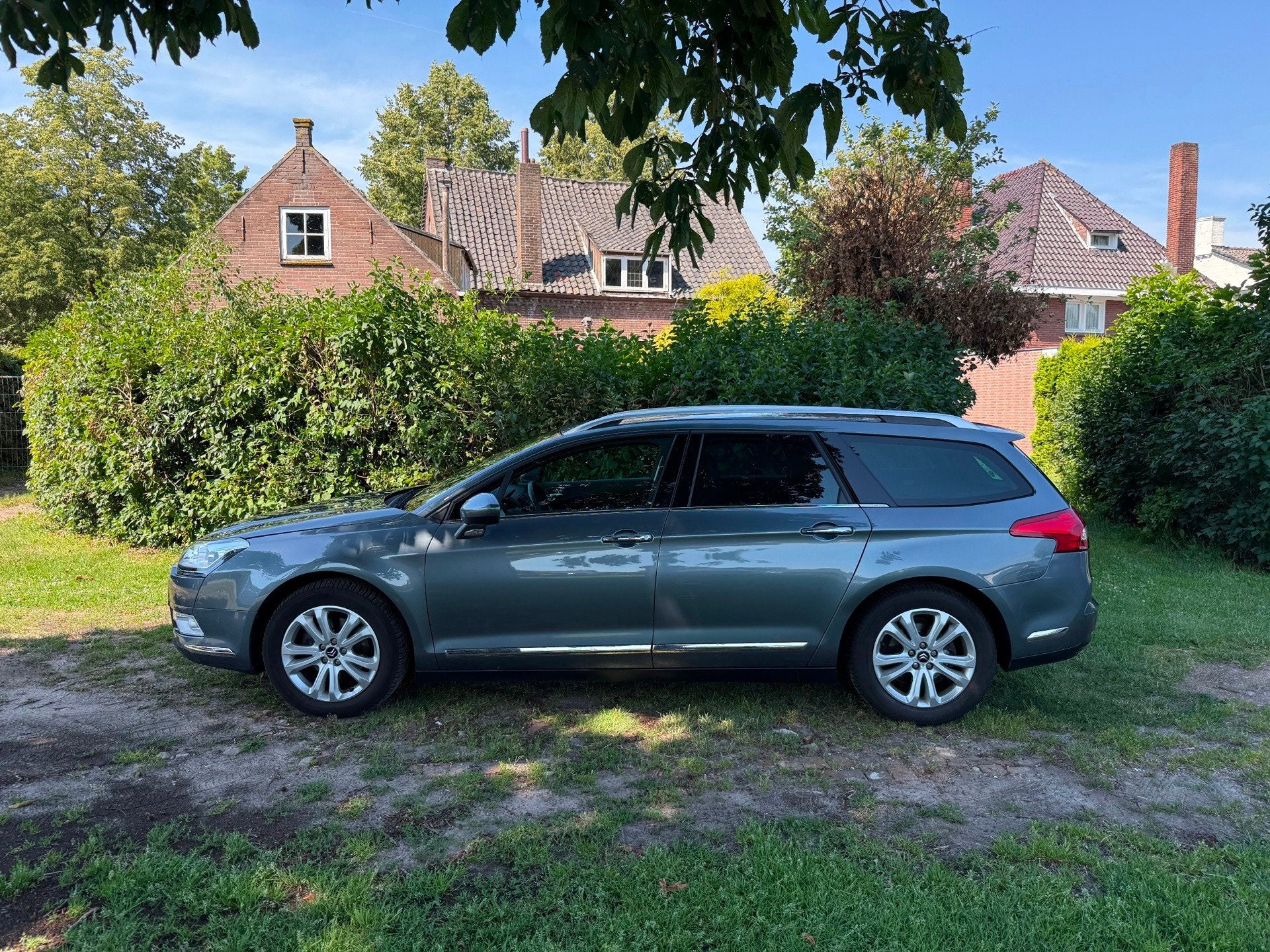 Citroen C5 Tourer 2.0 HDiF Exclusive AUTOMAAT EERSTE EIGENAA, Auto's, Gebruikt, Zwart, 4 cilinders, Leder en Stof