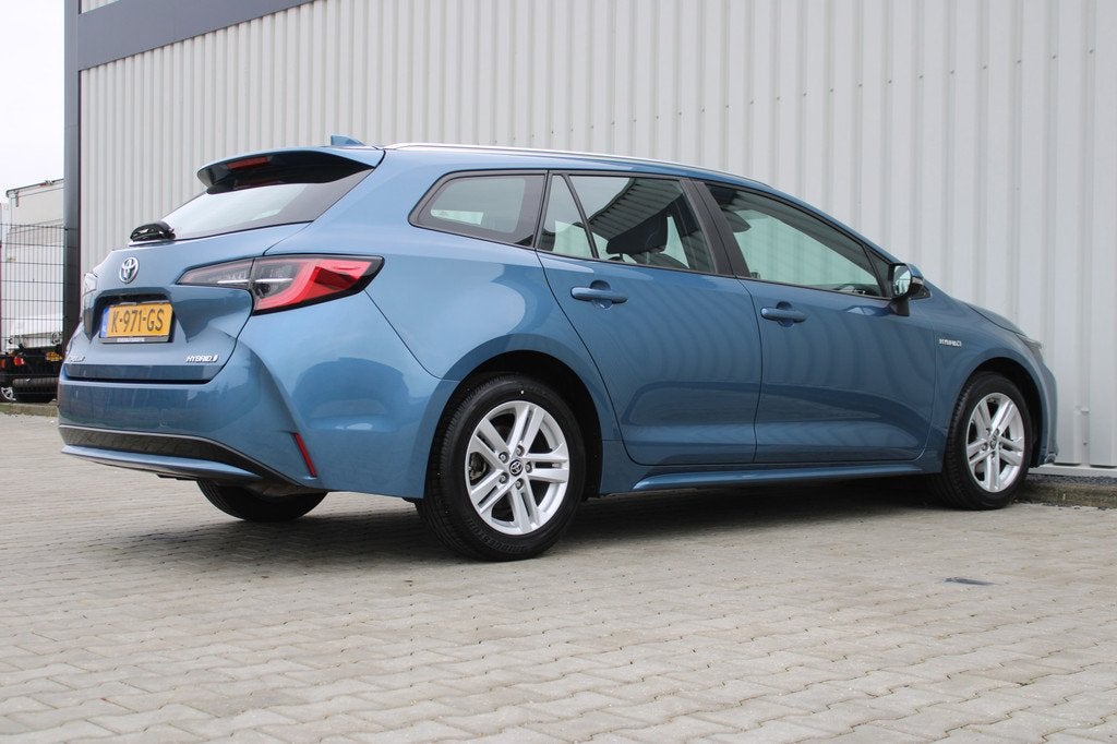 Toyota Corolla Touring Sports 1.8 Hybrid Business | Incl. 12, Auto's, Toyota, 12 maanden, Gebruikt, 4 cilinders, Blauw