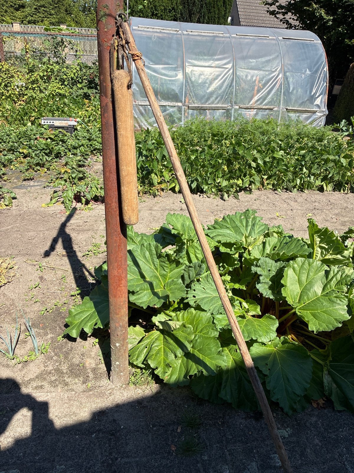 Vintage houten dorsvlegel, Ophalen