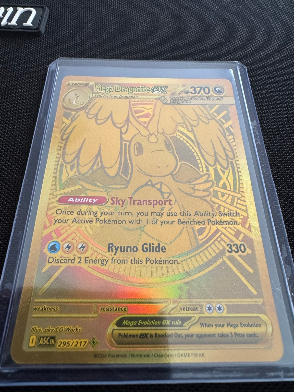 Mega Dragonite EX Pokémon Kaart - Gouden Foil, Ophalen of Verzenden, Zo goed als nieuw, Losse kaart, Foil