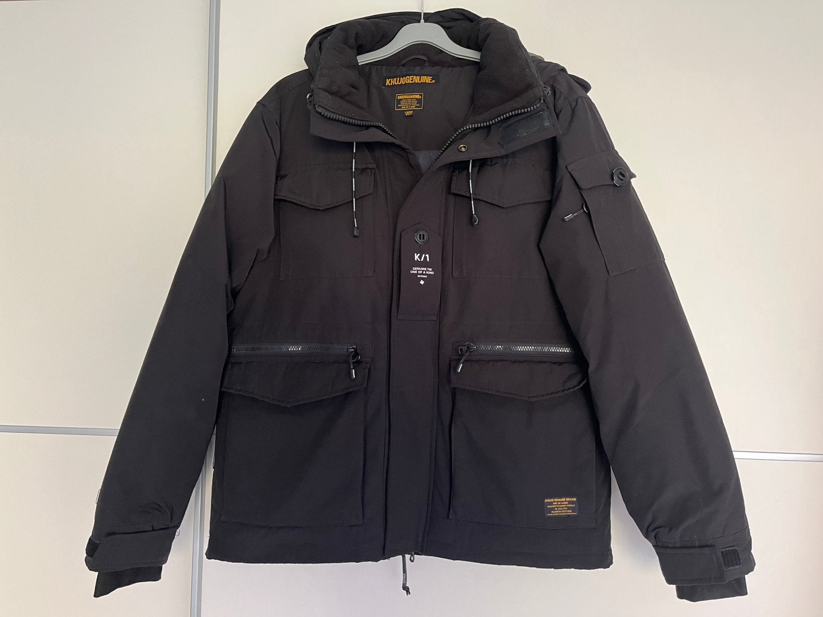 Nieuwstaat: Khujo heren winterjas maat L, Ophalen of Verzenden, Nieuw, Maat 52/54 (L), Zwart