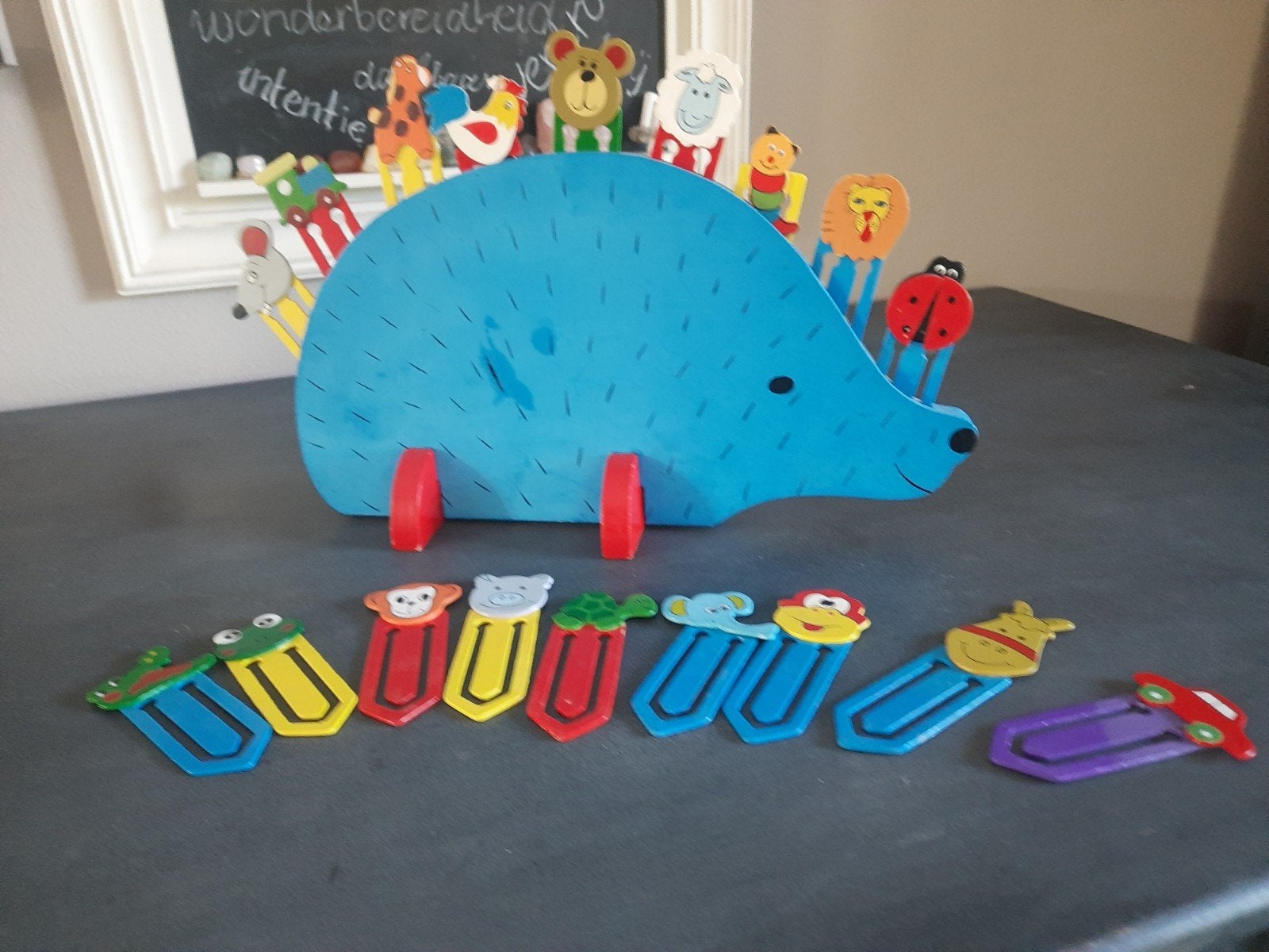 Egel boekensteun met dieren boekenleggers, Ophalen