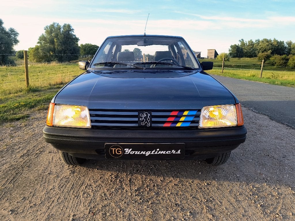 Peugeot 205 1.4 XR bwjr 1984 54.085 km!!!! <UNIEK!>, Voorwielaandrijving, 396 kg, Stof, 1360 cc