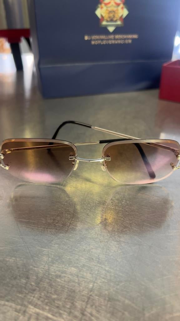 Cartier Piccadilly witgouden zonnebril inclusief bon, Ophalen of Verzenden, Zo goed als nieuw, Zonnebril, Overige merken