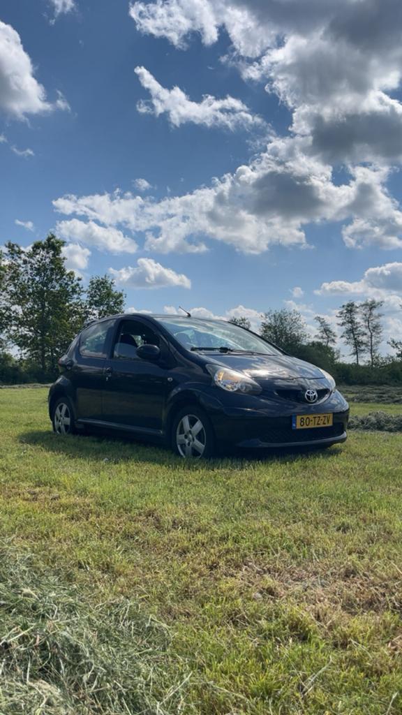 Toyota Aygo 1.0 Sport 2007 Zwart, Nieuwe APK!, Voorwielaandrijving, Stof, Zwart, 4 stoelen