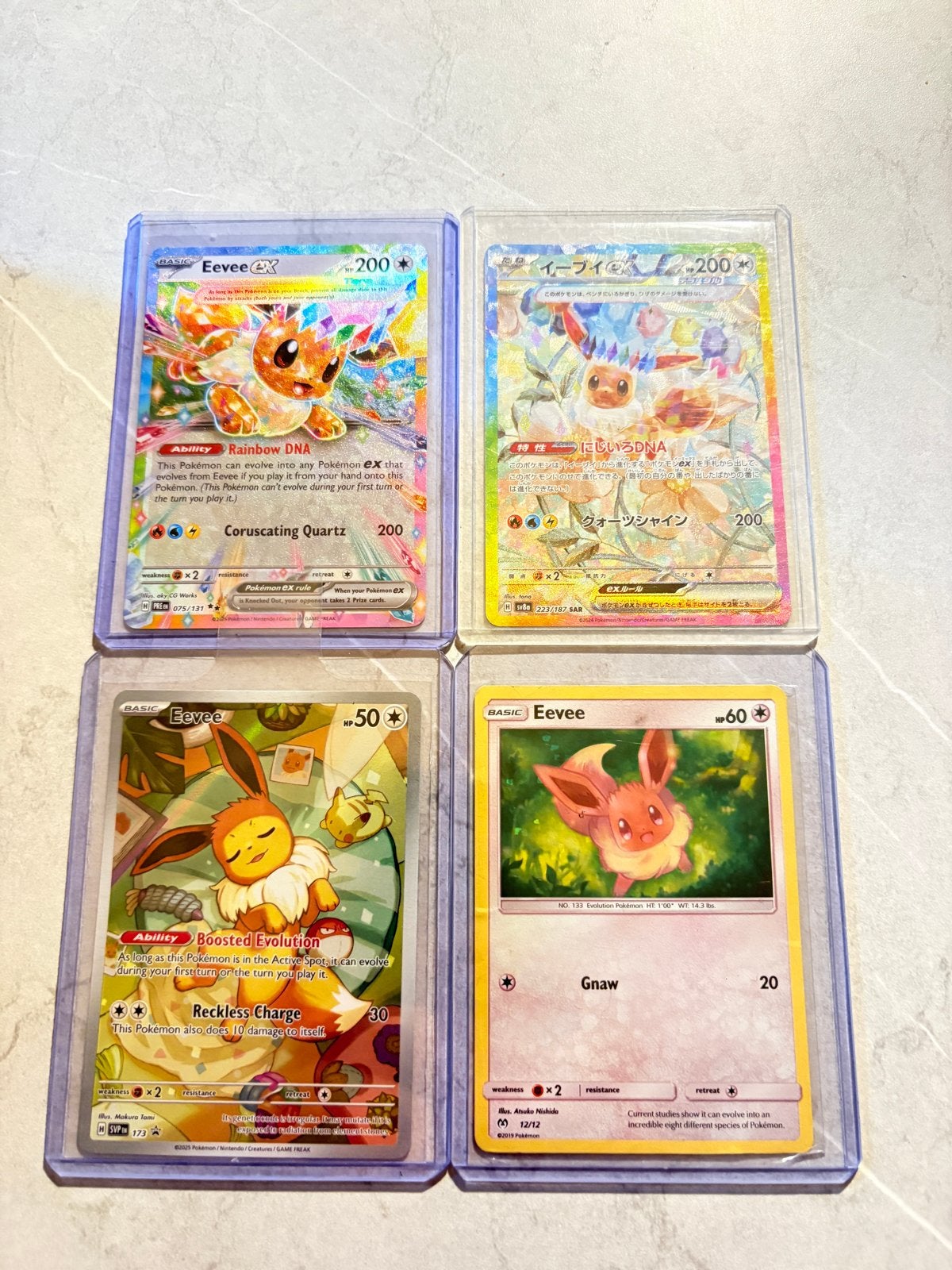 Pokémon Eevee GX en andere kaarten - Set van 4, Ophalen of Verzenden, Zo goed als nieuw, Meerdere kaarten, Foil