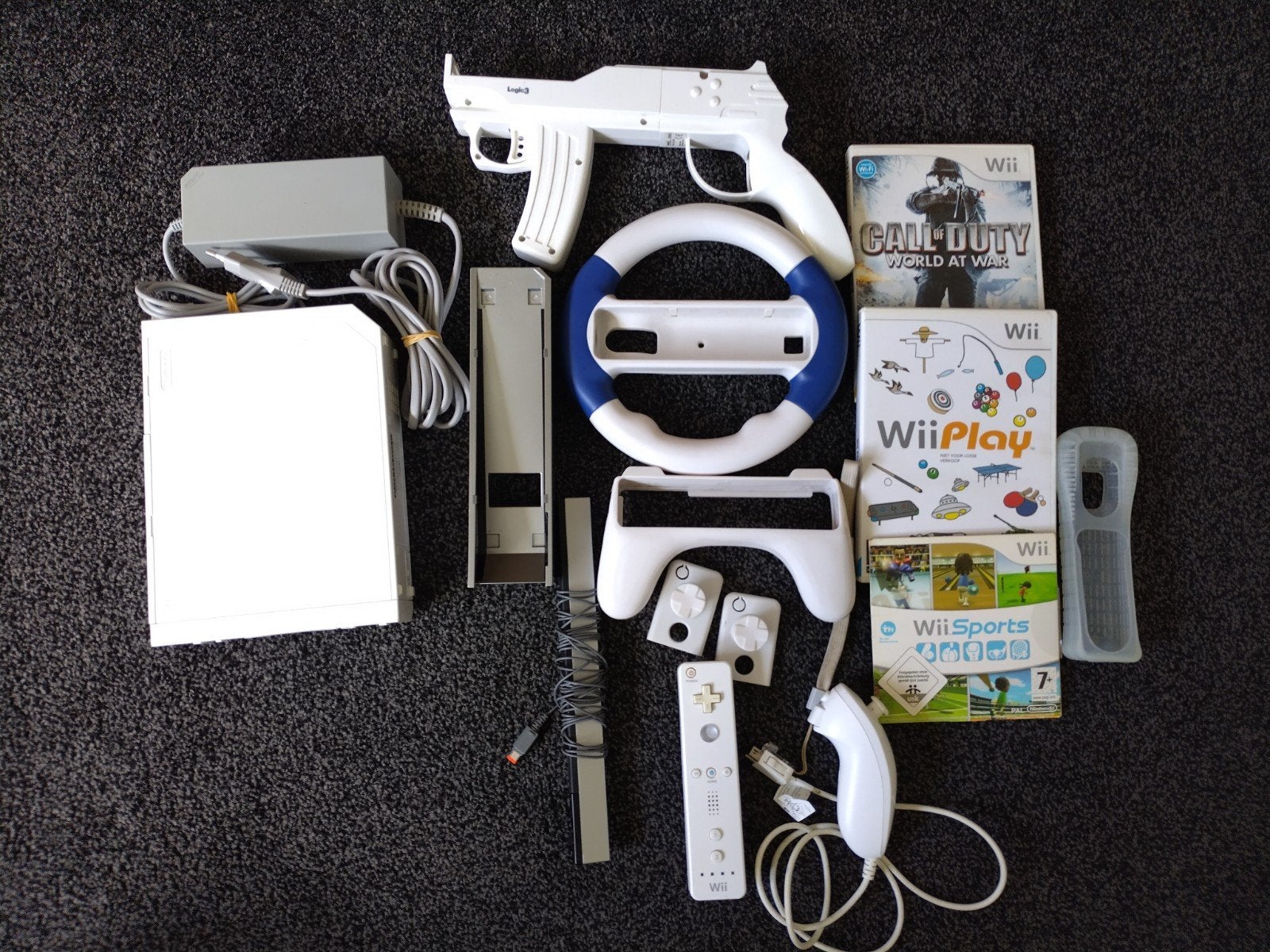 Nintendo Wii, Ophalen of Verzenden, Zo goed als nieuw, Met 1 controller, Met stuurtje