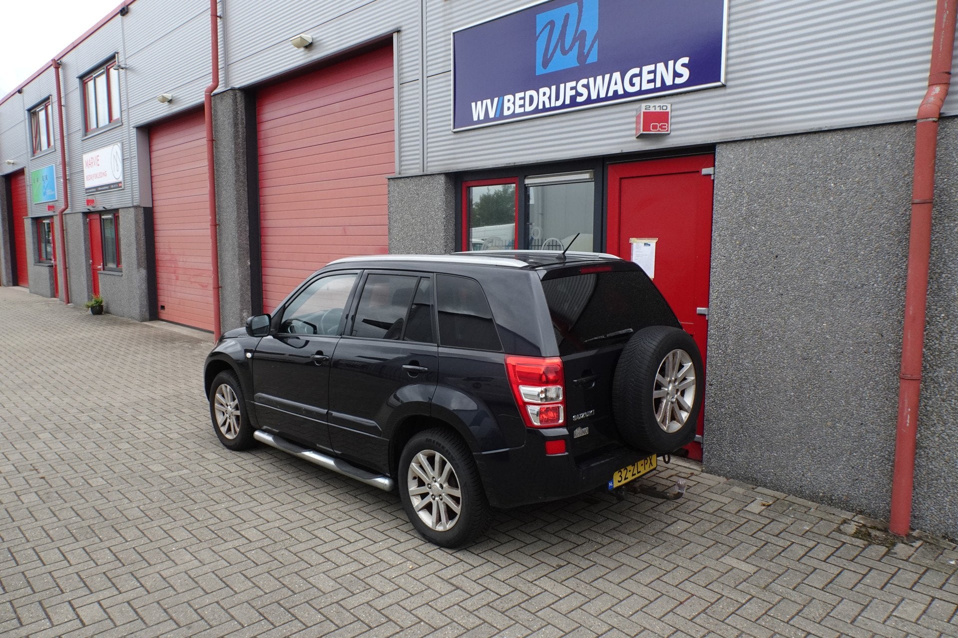 Suzuki Grand Vitara 2.0-16V Limited leer lmv sidebars, Auto's, Suzuki, Zwart, 4 cilinders, 1850 kg, Grand Vitara