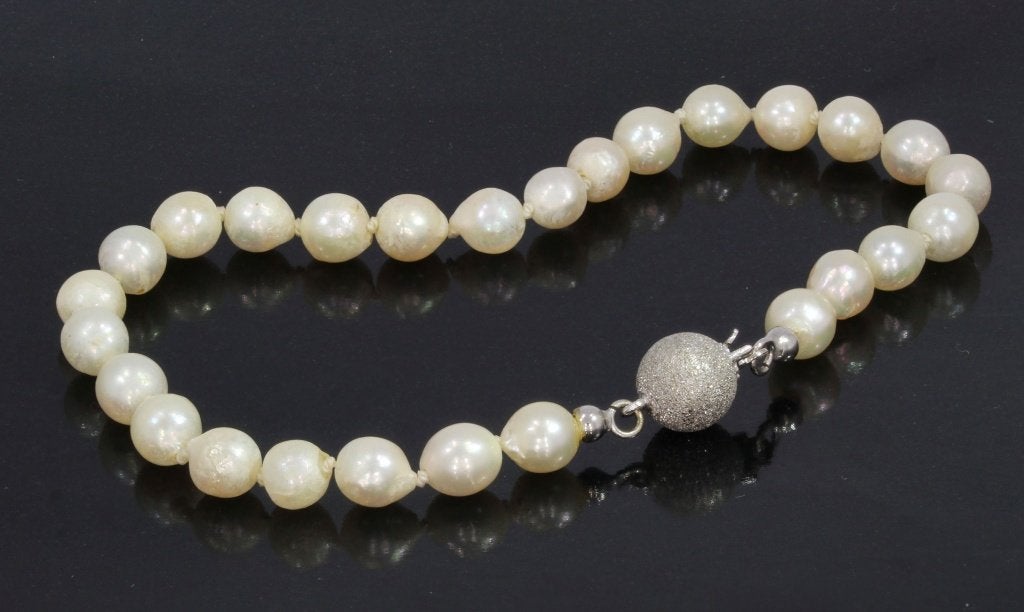 Parel armband fraai 14k gouden slot dames vintage luxe, Voordeelsieraden, Ophalen of Verzenden, Zo goed als nieuw, Met edelsteen