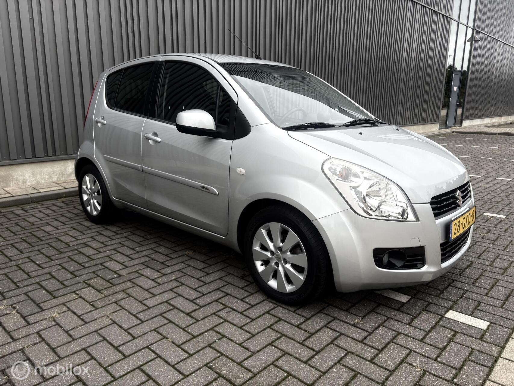 Suzuki Splash 1.2 Exclusive lage Km stand .Grotebeurt +Nieuw, Auto's, Voorwielaandrijving, 86 pk, 4 cilinders, 965 kg