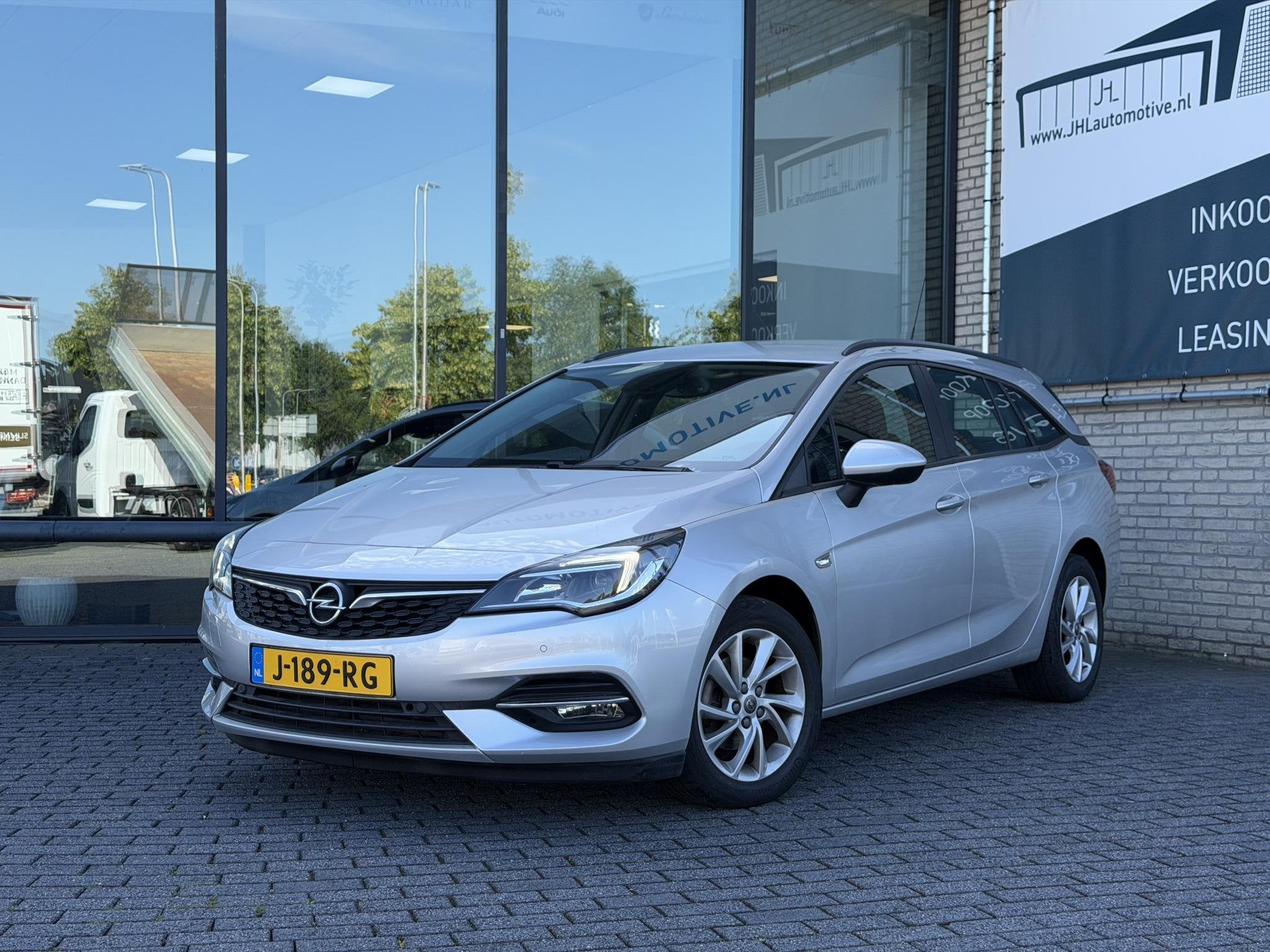 Opel Astra Sports Tourer 1.2 Edition*NAVI*ECC*CRUISE*CAMERA*, Auto's, Voorwielaandrijving, Stof, Gebruikt, 1199 cc