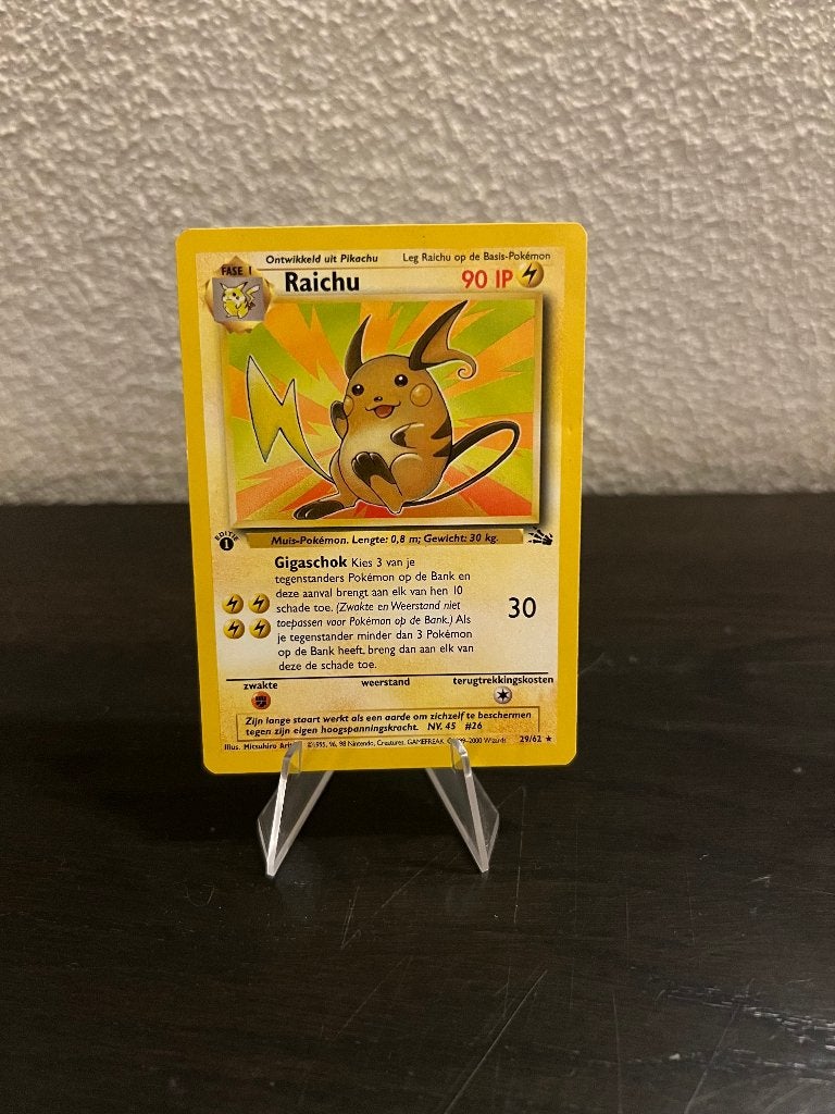 Raichu 29/62 1st Edition – Fossil – Excellent Nederlands, Ophalen, Zo goed als nieuw, Losse kaart