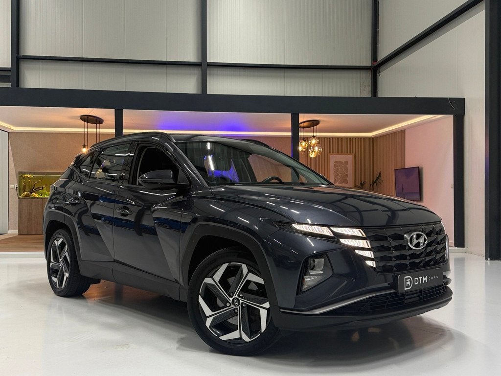 Hyundai Tucson 1.6 Plug-in Hybrid 265pk Vierwielaandrijving, Auto's, Hyundai, Automaat, Stof, Gebruikt, 4 cilinders