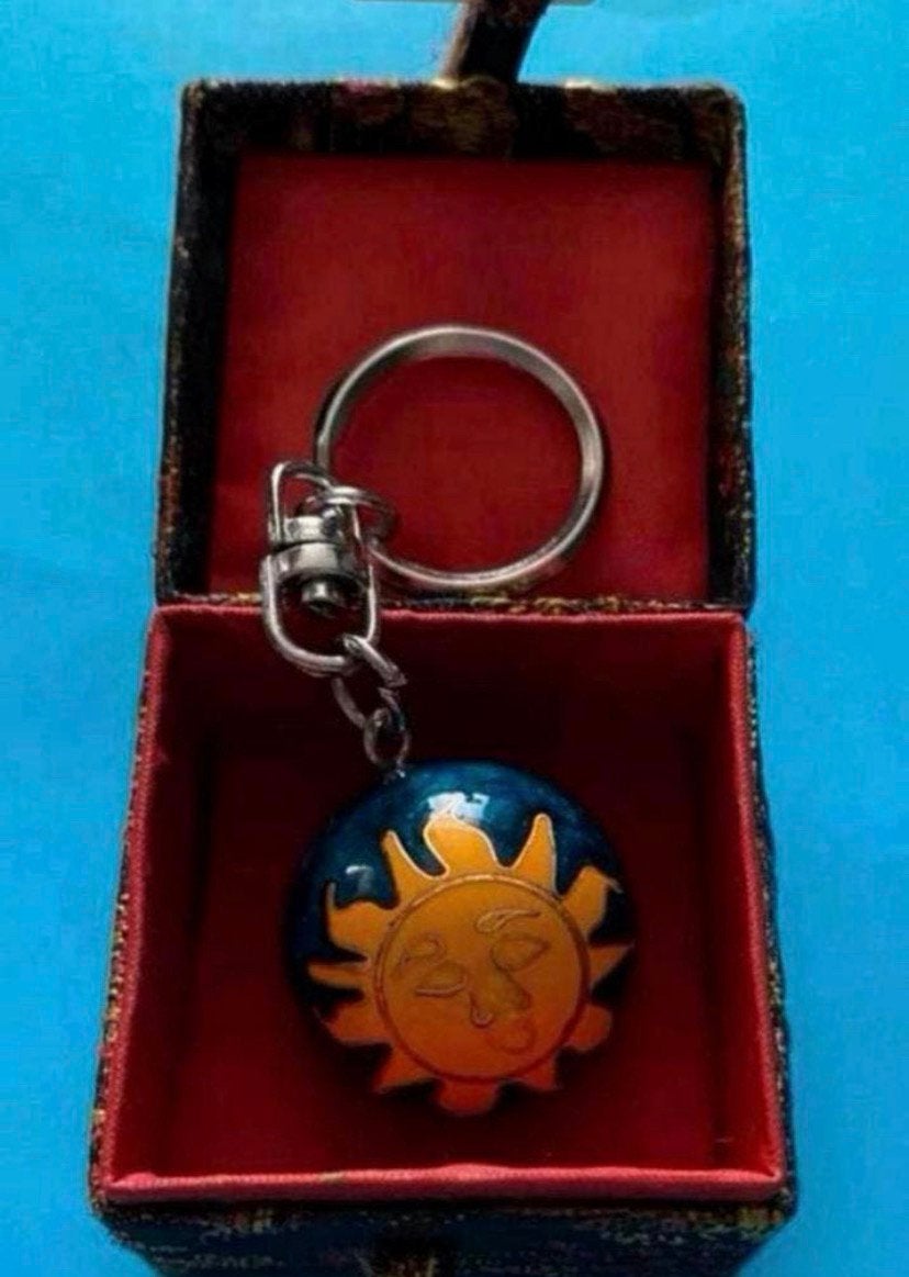 Sleutelhanger met zonnetje / en klanken, Verzenden, Zo goed als nieuw