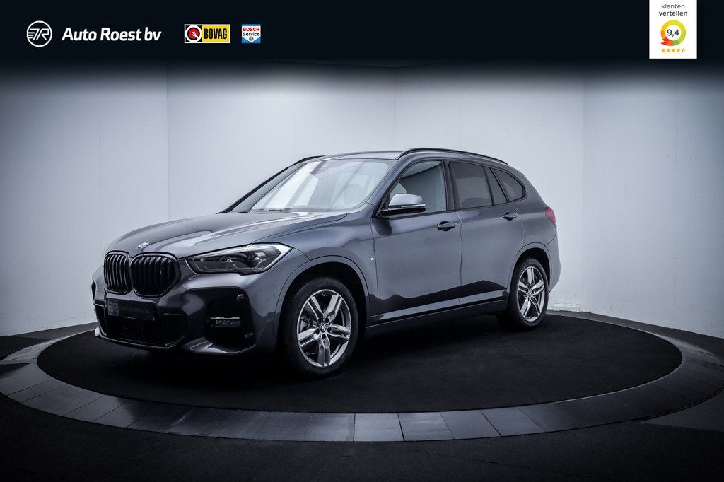 BMW X1 20iA M-SPORT High Executive UNIEKE KM | DEALER AUTO |, 1998 cc, Zwart, 179 pk, Bedrijf