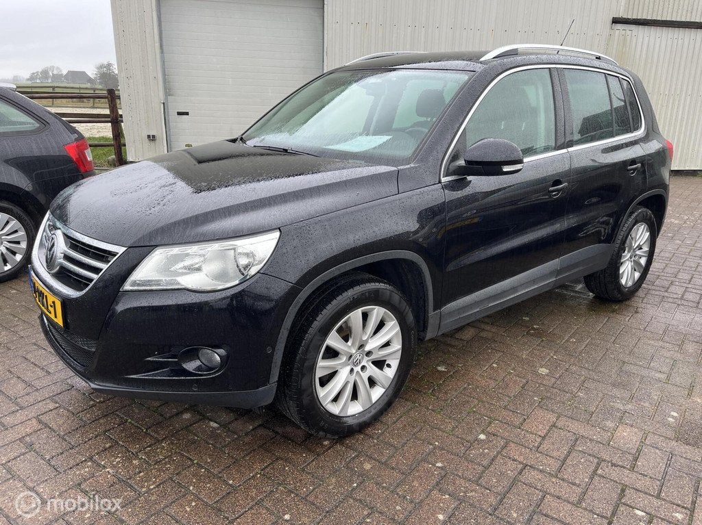 Volkswagen Tiguan 1.4 TSI Sport&Style wegklap TREKHAAK, Auto's, Voorwielaandrijving, Euro 5, 15 km/l, 4 cilinders