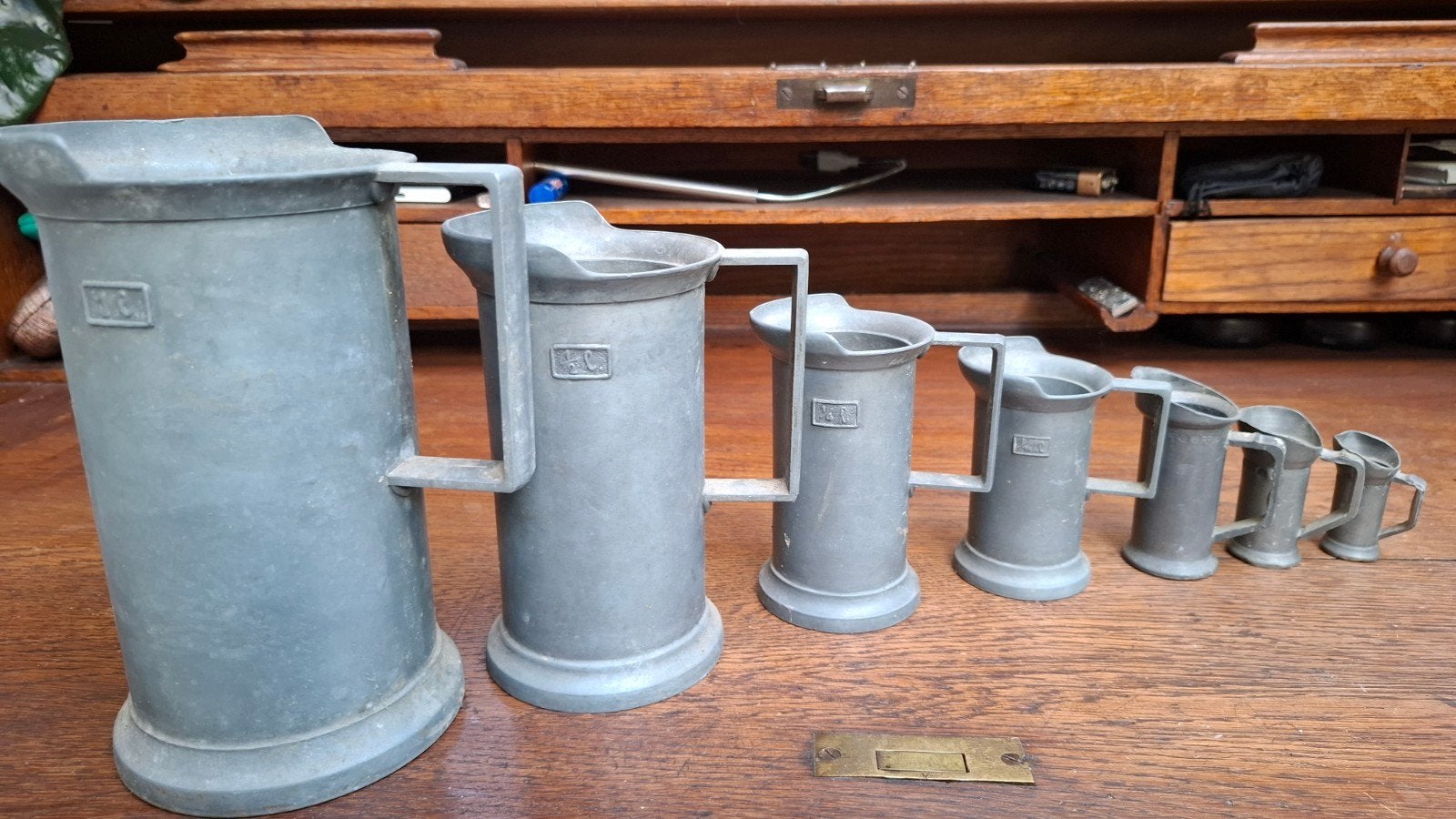 Antieke tinnen maatbekers set - 7 stuks, Ophalen of Verzenden