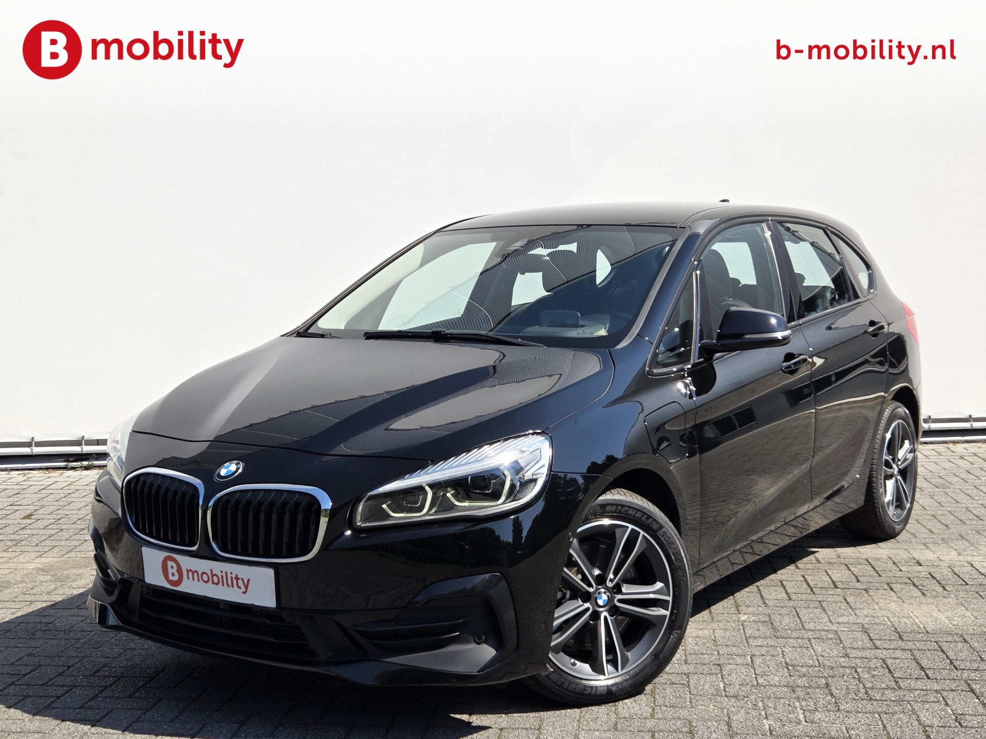 BMW 2 Serie Active Tourer 225xe PHEV Hybride High Executive, Auto's, Gebruikt, Leder en Stof, Zwart, Bedrijf